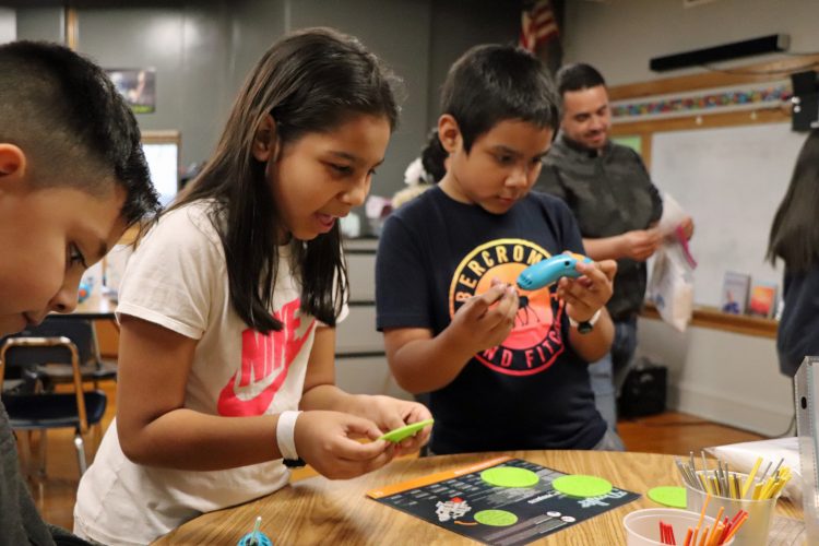 Students demonstrating Lab 101 3D pens.