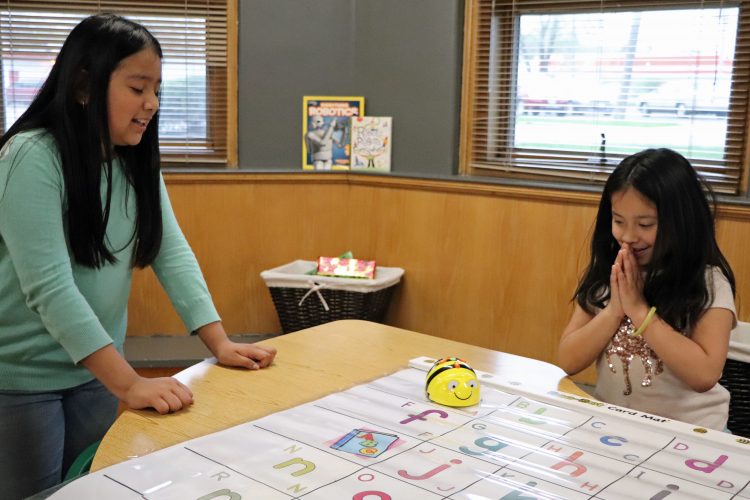 Students demonstrating Lab 101 Bee Bots.