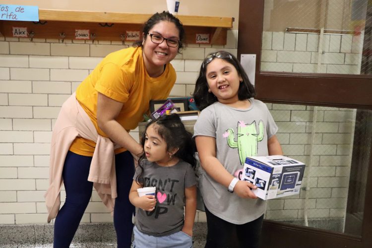 Beaupre family with STEM Family Night raffle prize.