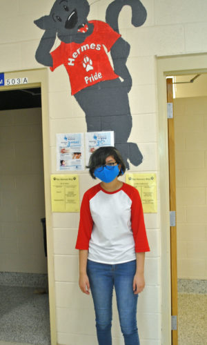 A student shows off her red and white for School Spirit Day!